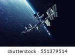International Space Station over the planet Earth. Elements of this image furnished by NASA