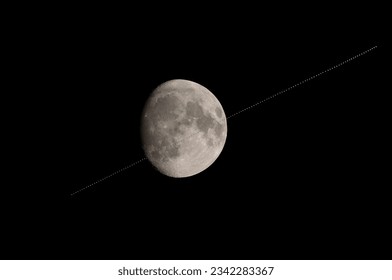 International Space Station transiting towards the moon, July 29, 2023 over Ottawa, Canada. This is a composite of 128 photos showing the path of the ISS - Powered by Shutterstock