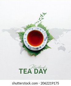 International Tea day. green Tea with leaf, bird and world map concept . design for social media. 335 - Shutterstock ID 2062219175