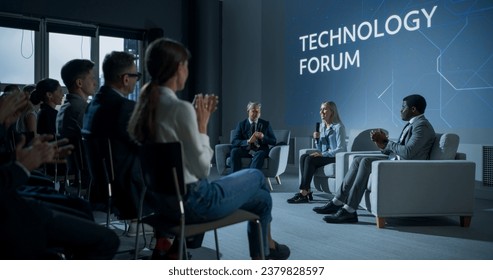International Technology Conference: Host Asking Caucasian Female Tech CEO a Question In Front Of Audience. Successful Woman Delivering Inspirational Speech And Diverse Attendees Applaudding Her. - Powered by Shutterstock