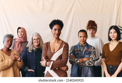 International Women's Day portrait of confident multiethnic mixed age range women looking towards camera, Embrace Equity - Powered by Shutterstock