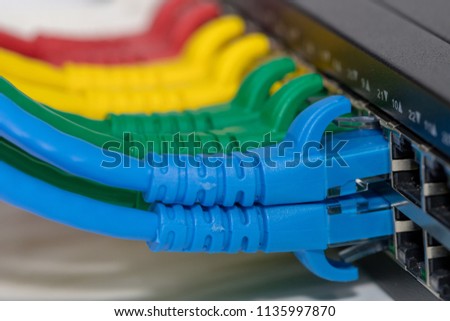 Interner network,Lan cables connected in network switche hub.