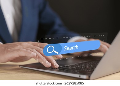 Internet browsing concept, search engine, online web browser, seo optimization. Businessman using laptop with search engine bar on virtual screen.