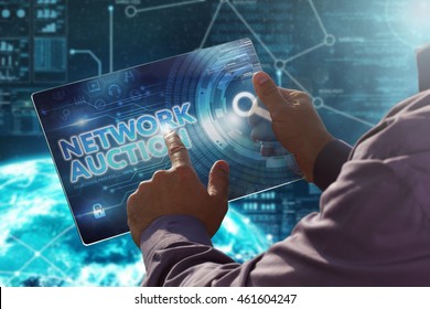 Internet. Business. Technology concept.
Businessman presses a button Network Auction on the virtual screen tablet future date.