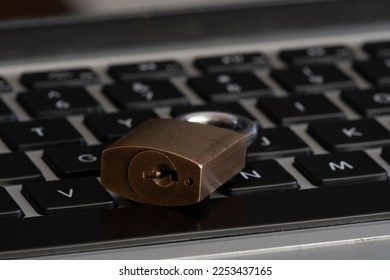 Internet and computer security represented by a closed padlock over a keyboard