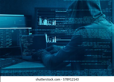 Internet crime concept. Hacker working on a code on dark digital background with digital interface around. - Shutterstock ID 578912143