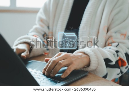 Internet education concept, e-learning resources, e-library, e-book, distant online courses. Businessman using laptop e-book icons on virtual screen.