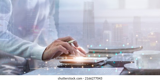 Internet Network Connection Digital Data Technology With Man Using Smartphone At Workplace And Digital Data Network And City Background