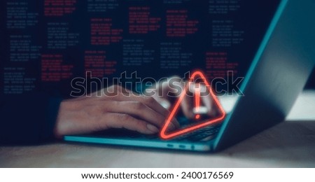 internet network security concept, man typing on keyboard with triangle warning sign developer with triangle caution warning sign for notification error and maintenance, e-document data protection