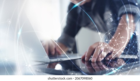 Internet network technology, digital software development, future tech background, IoT concept. Man using digital tablet and laptop with global network connection, computer code