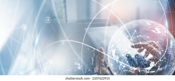 Internet network technology, digital software development, future tech background, IoT concept. Man using digital tablet and laptop with global network connection, computer code - Shutterstock ID 2107622915