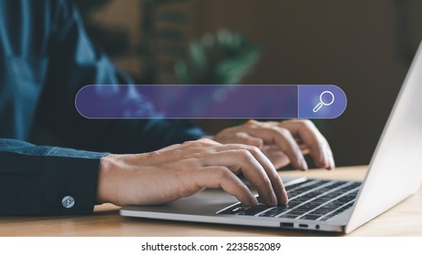 Internet search concept, man hand typing on laptops to searching information or job via internet technology. Data communication world wide connection. - Shutterstock ID 2235852089