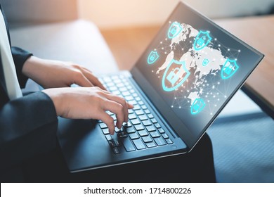 Internet security, online privacy concept, Abstract image of business woman using laptop under protection of encyption of data on internet - Shutterstock ID 1714800226