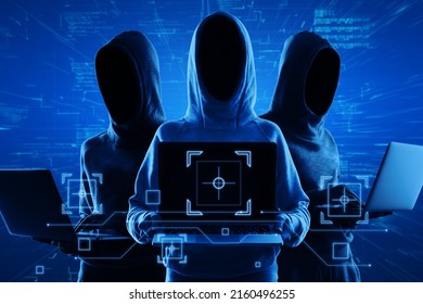 Internet Security And Personal Data Theft Concept With Blue Shadows Faceless Hackers In Hoody Using Laptop And Abstract Virtual Technological Symbols