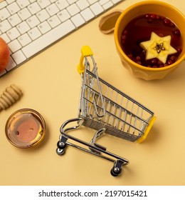 Internet Shopping Autumn Seasonal Shopping Concept White Keyboard Shopping Cart Trolley Tea Honey Square