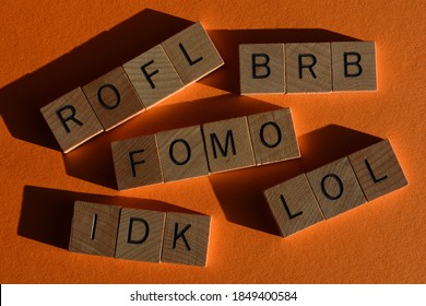 Internet slang, acronyms including ROFL, Rolling on Floor Laughing, FOMO, Fear of Missing Out