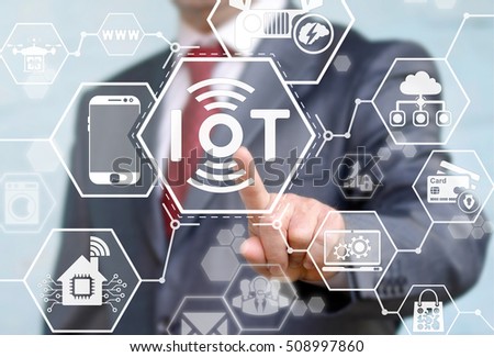 Internet of things (IoT) concept. Businessman presses IoT solution represented by symbol connected with icons of typical IoT. Intelligent house, car, camera, watch, washing machine. Smart digital home