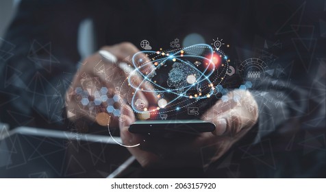 Internet of Things, IoT, global network technology, digital marketing, big data, software development concept. Business man using mobile phone with global network, technology icons on virtual screen - Powered by Shutterstock - Get 15% off with code: PIKWIZARD15