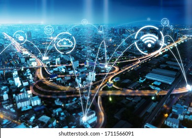internet of things IOT smart futuristic city landscape with information communication technology ICT concept, wireless data transmission connection transfers and cloud data storage, at blue night sky