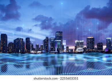 Internet of things, smart city, high speed connection and smart grid concept with digital blue wavy wires with antennas on night city skyline background, double exposure