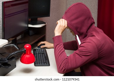 Internet Troll Using The Computer. Bad Young Man Writing Nasty Things On The Forum
