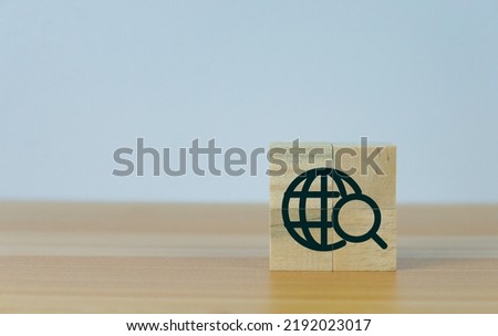 internet or www, world wide web icon or symbol on a wooden cube 