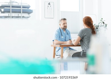 Internist and patient during medical consultation in the doctor's office