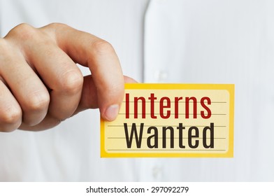 Interns Wanted Card In Hand