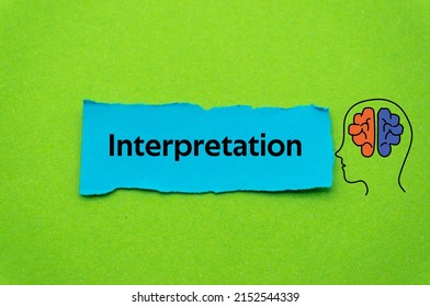 Interpretation.The word is written on a slip of colored paper. Psychological terms, psychologic words, Spiritual terminology. psychiatric research. Mental Health Buzzwords. - Shutterstock ID 2152544339