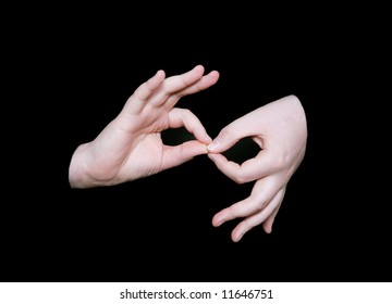 The Interpreting Sign In Sign Language On A Black Background