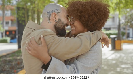 Interracial couple embracing lovingly in a sunny urban park, depicting joy and diversity. - Powered by Shutterstock