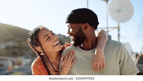 Interracial couple, hug and bonding on city building rooftop for summer holiday, travel vacation date and location break in Boston. Smile, happy black man and talking woman or student fashion friends - Powered by Shutterstock