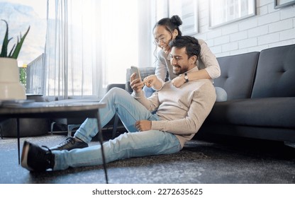 Interracial, couple and people with phone on social media laughing at meme or funny internet content. Man, woman and lovers relax in home, house or apartment browsing the web, website or app - Shutterstock ID 2272635625