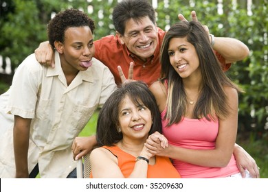 Interracial Family Of Four Acting Silly