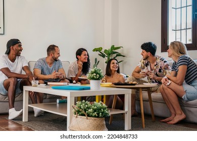 Interracial Group Of Friends Celebrate An Afternoon Snack