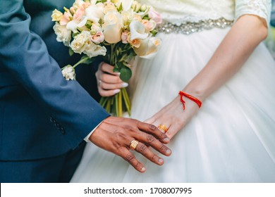 
Interracial Marriage, Hand In Hand, A Bouquet Of The Bride