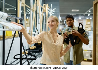 Interracial Married Couple Buyer At Furniture Market