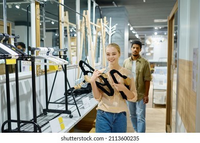 Interracial Married Couple Buyer At Furniture Market