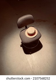 Interrogation Chair With Hat In Basement