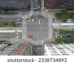 An intersection or an at-grade junction is a junction where two or more roads converge, diverge, meet or cross at the same road.