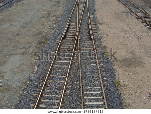 The\
intersection of two railway lines. Railway.\
Rails.
