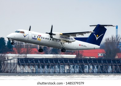 InterSky Bombardier DHC-8-314Q Dash 8. Registration: OE-LIC, Manufacturer Serial Number: 503, Taking Off From The Runaway At The Berlin Tegel Airport. Berlin, Germany March 2, 2013.