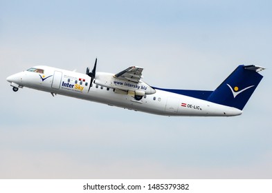 InterSky Bombardier DHC-8-314Q Dash 8. Registration: OE-LIC, Manufacturer Serial Number: 503, Taking Off From The Runaway At The Berlin Tegel Airport. Berlin, Germany March 2, 2013.