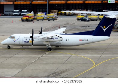 InterSky Bombardier DHC-8-314Q Dash 8. Registration: OE-LIC, Manufacturer Serial Number: 503, Taxing To The Runaway At The Berlin Tegel Airport. Berlin, Germany March 2, 2013.