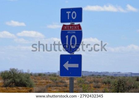 Interstate 10 Route Marker and Directional Road Sign in the Arizona Desert Landscape