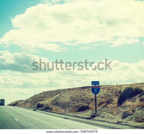 Interstate 5\
sign in Pacific Coast Highway,\
California