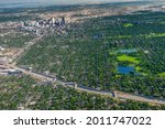 Interstate 70 passes by Denver Colorado as seen from above