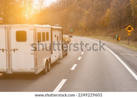 interstate highway road. car with trailer on the way 