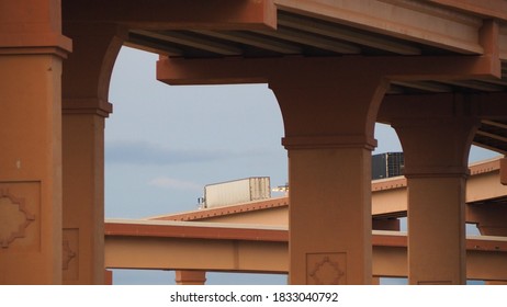 Interstate Highway System Concrete And Freight Trucks Crossing