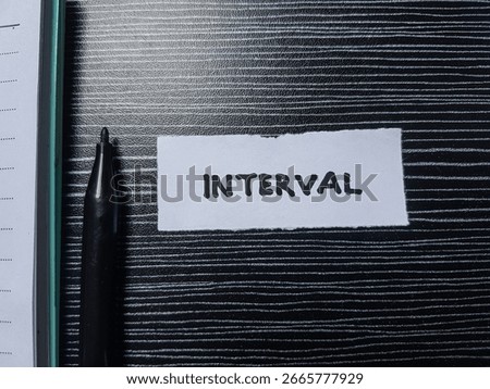 Interval writting on table background.